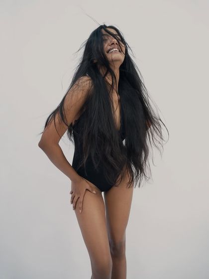 The color version of this shot is energetic, but the black and white reveals the soul. It's a raw, joyful moment of pure freedom.