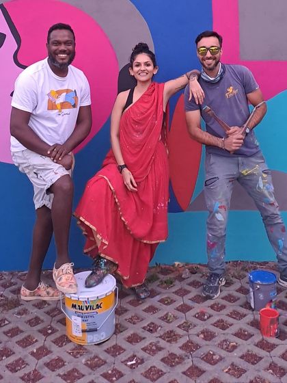 Posing with fellow artists at the international graffiti festival.