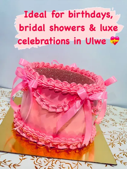This is my Pinterest-inspired Pink Bow Cake, perfect for luxe celebrations. It features delicate, hand-piped buttercream ruffles and is adorned with real satin ribbons for an extra touch of elegance.