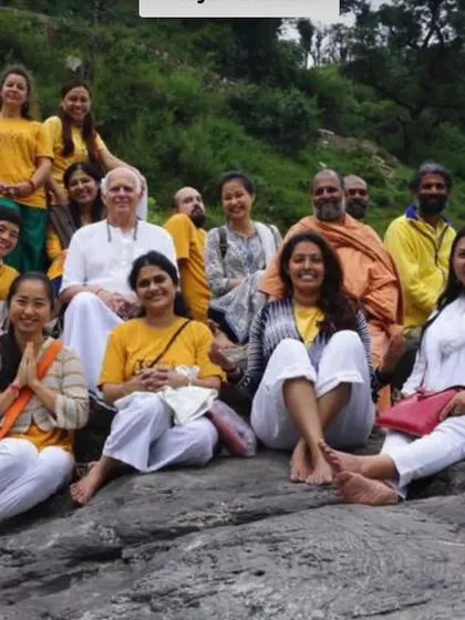 A joyful moment with students, resting together in nature. The bonds formed at the ashram create a global Sangha, a spiritual family that supports one another on this path.
