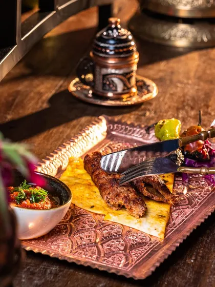 Indulge in the grandeur of our 1.5-meter Adana Kebab. This is more than a meal; it's an ultimate dining indulgence, perfect for sharing and creating a memorable experience.