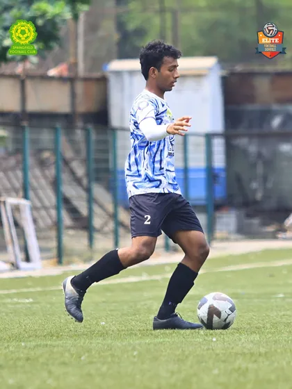 A player showcasing control and focus during a competitive match. Every player is trained to be comfortable and confident on the ball.