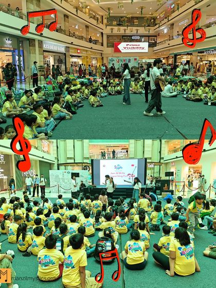 More scenes from our summer camp at Ambience Malls. These images show our facilitators engaging a large group of children in interactive music and songwriting activities in a public space.