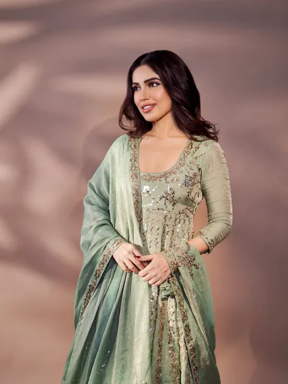 Bhumi Pednekar in a graceful sage green anarkali for the 'Pariksha Pe Charcha' event. The subtle sequin work and classic silhouette make it a sophisticated and event-appropriate choice.