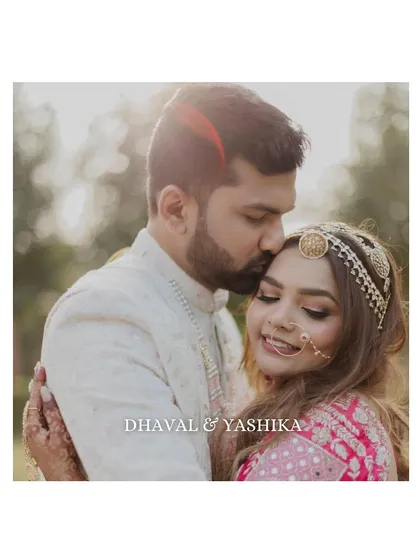 A gentle forehead kiss speaks volumes. This candid couple portrait, taken in the soft light of day, is all about the tenderness and trust between the bride and groom on their wedding day.