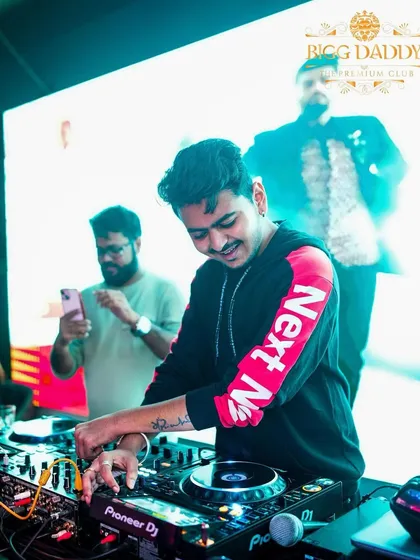 In my zone at Bigg Daddy, one of Bangalore's premium clubs. A smile on my face and hands on the deck, I am focused on one thing: making sure the crowd has the best night possible. This is what I love to do.