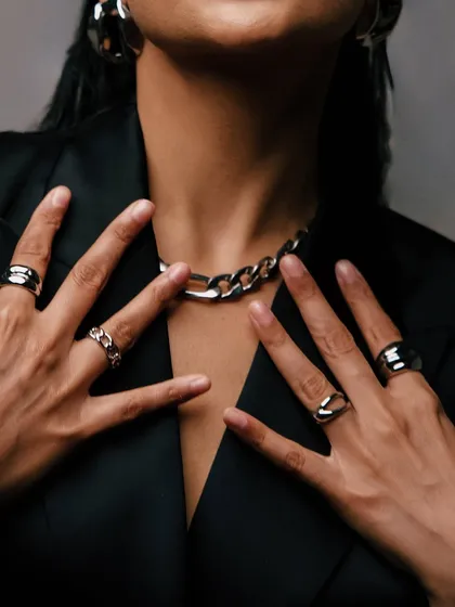 A detail shot focusing on the chunky silver jewelry that completed my studio look.