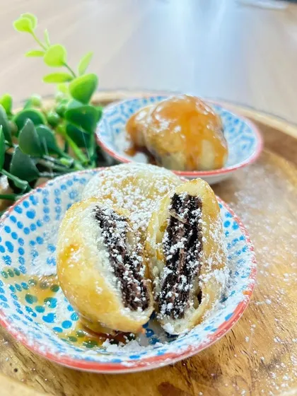 Our innovative Chocolate Chip Cookie Gulgules. We've taken the traditional Indian sweet and stuffed it with a gooey chocolate chip cookie center.