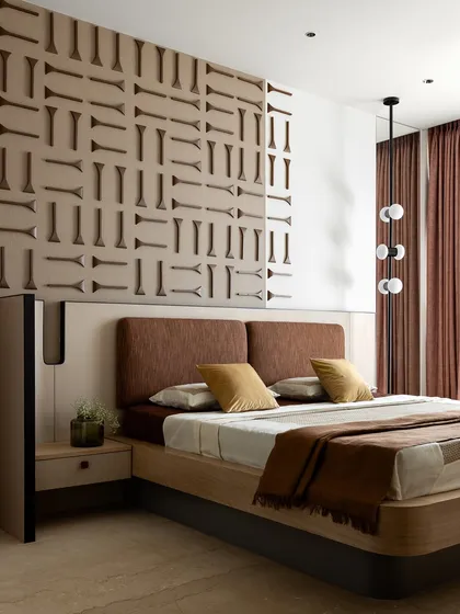 The full view of the bedroom, showing how the custom wall panel, bed, and side tables all work together to create a cohesive and luxurious space.