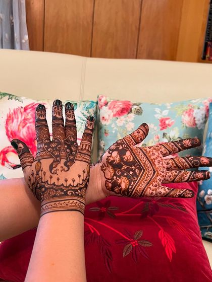 Another view of the intricate bird design, showing how the patterns on both hands create a beautiful, cohesive look.