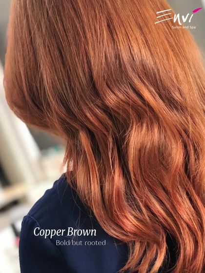 A vibrant Copper Brown. This color is bold but rooted, offering a fiery look that’s still warm and approachable.