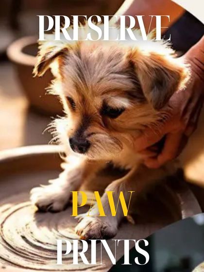 Preserve those precious paw prints. A photo of a cute puppy getting ready to make their mark.