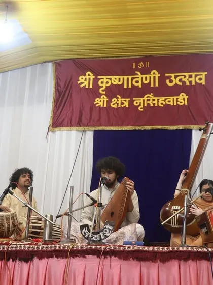 On stage at the prestigious Krushnaveni Utsav at Shri Kshetra Nrusinhawadi, a sacred place for devotees of Lord Dattatreya.