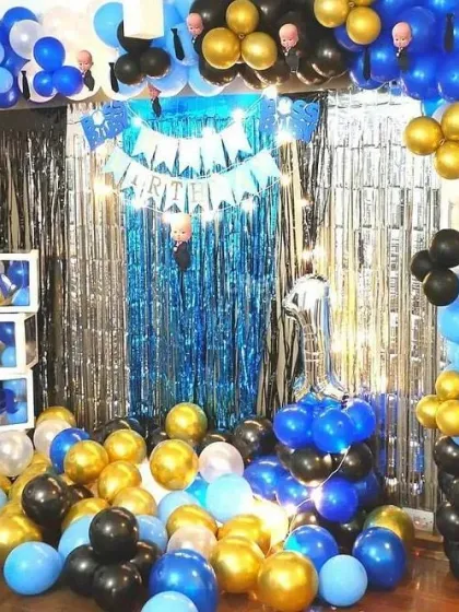 A Boss Baby themed birthday party, using blue, black, gold, and white balloons to create a fun and stylish look.