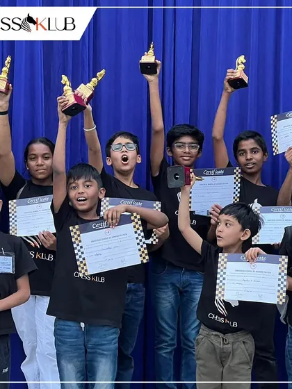 The thrill of victory! Our students proudly display their trophies and certificates after a spectacular performance at the Universal First Age Category Children Chess Tournament. We love seeing our champions shine.