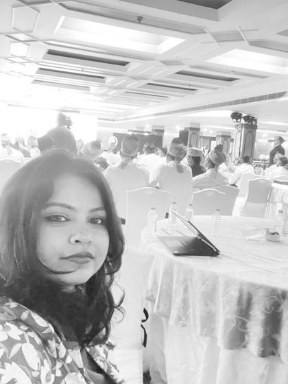 A black and white selfie before a show, with the audience in the background. A moment of quiet reflection before the performance begins.