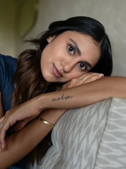 Building trust with the person in front of my lens is key. It allows for intimate and honest portraits like this one, capturing a quiet confidence that draws the viewer in.