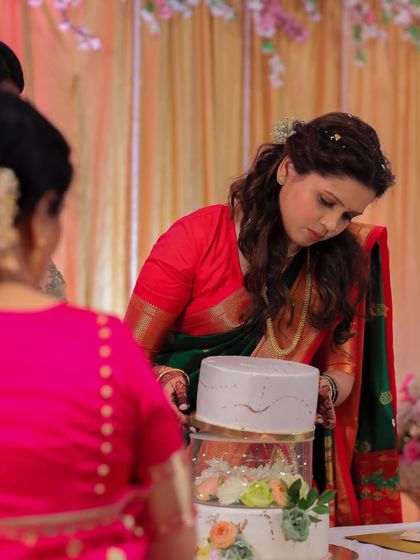 Putting the final touches on my own engagement cake. It was a challenge to manage, but so rewarding to see it all come together.