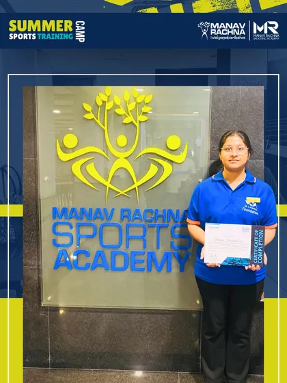 A young shooter with her completion certificate. Our summer camp is designed to build confidence and ignite a passion for the sport, providing a rewarding experience for all participants.