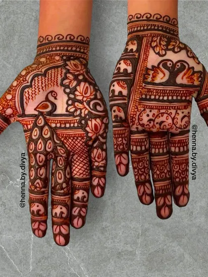 A design filled with classic Indian motifs, including a peacock, lotus flowers, swans, and elephants. The combination of these elements creates a rich and auspicious look.
