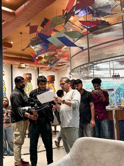 The director and camera team reviewing the script and shot list. I make sure I'm always prepared and understand the objective for each scene.