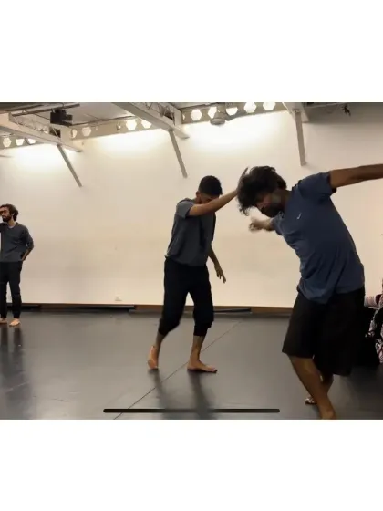 A moment of focused movement during our workshop. We guide participants through exercises that build a deep connection with different parts of the body.