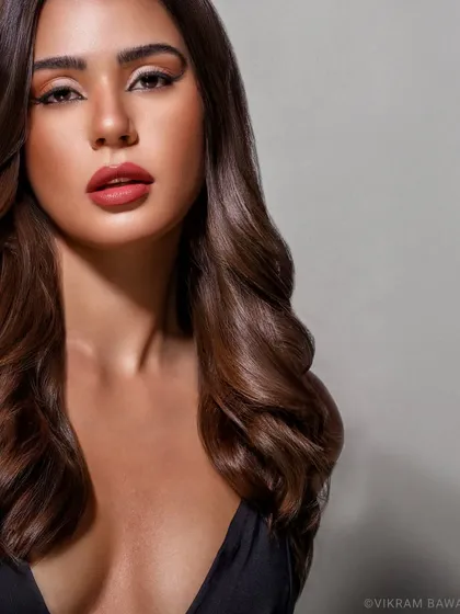 A little light, a little shadow, and a whole lot of glam. This beauty portrait uses soft shadows to add depth and dimension to the face.