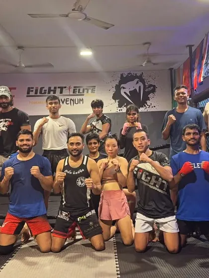All smiles after a hard sparring session. Moments before, these fighters were pushing each other to the limit, a testament to the respect and camaraderie we build in our gym.