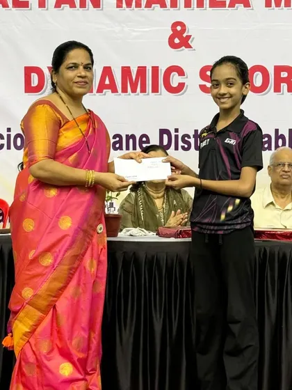 Saisha Madhur receives her prize for winning her first career silver medal in the U-13 category at the 1st Maharashtra State Ranking in Dombivili.
