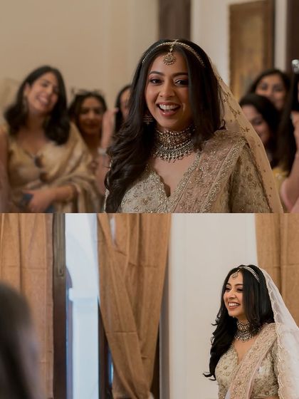 The priceless reaction of the bride's squad seeing her for the first time. Her glowing makeup and happy smile light up the room.