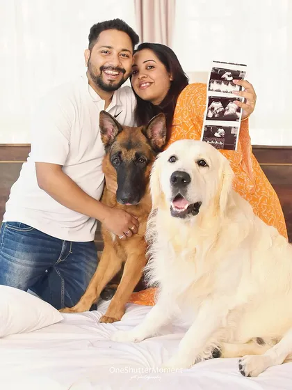 The whole family is getting ready for the new arrival. This indoor maternity session shows how we can create beautiful, intimate portraits right in the comfort of your home, with your beloved pets right by your side.