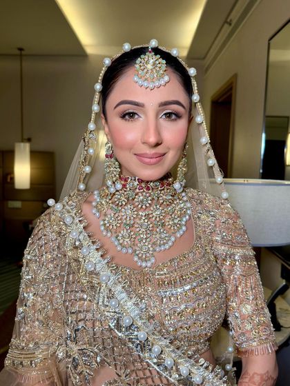 A beautiful portrait of my happy bride. The makeup is designed to enhance her natural features and give her a radiant glow.