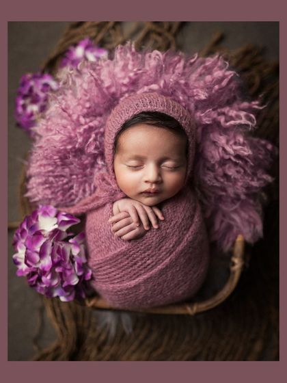 A beautifully edited version of the final portrait, with a soft color frame that complements the purple tones of the setup.