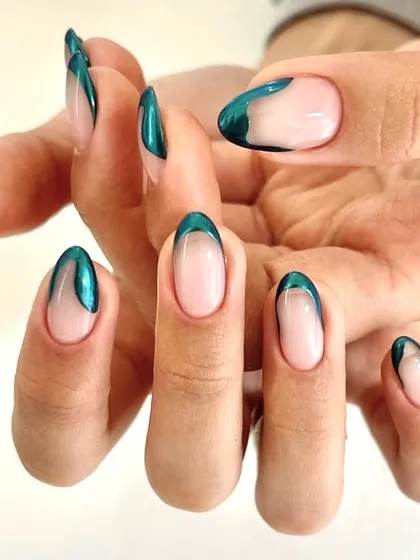 A bold and beautiful emerald green chrome French tip. This is how you make a classic style feel fresh and exciting.
