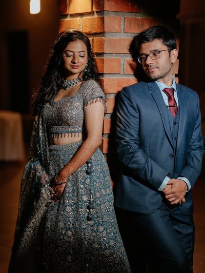 A romantic couple shot, her soft glam makeup looking beautiful.
