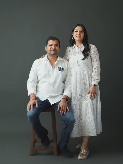 A simple and elegant studio portrait of a couple. Before the kids join in, we love to take a few moments to capture the parents together, celebrating their connection.