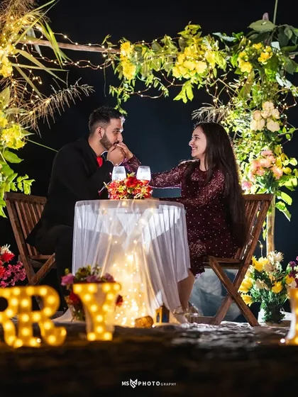 Let's plan the perfect surprise. I help set up magical proposal moments, complete with fairy lights, floral arrangements, and "Marry Me" signs, ensuring the moment you say 'yes' is captured beautifully for you to remember forever.