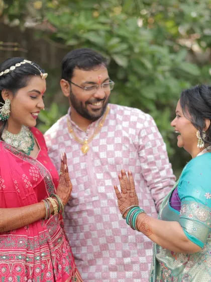 A happy, candid moment with family. The bride's makeup looks natural and beautiful, perfect for these intimate pre-wedding functions.
