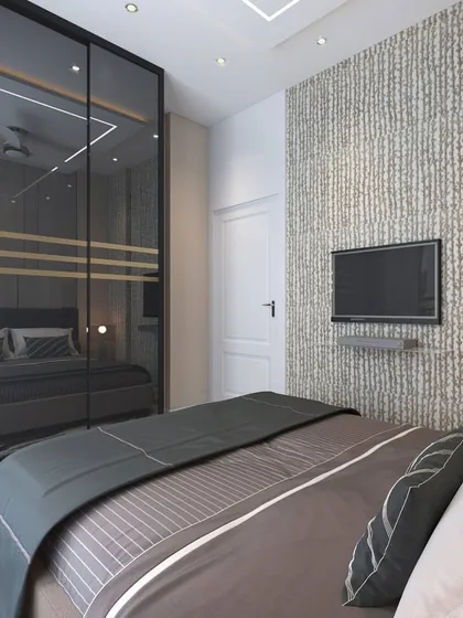 A 3D render of a bedroom with a smoked glass wardrobe and a textured accent wall. This visualization helps in understanding how reflective surfaces will impact the room's lighting and feel.