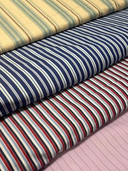 Our collection of shirting fabrics allows you to customize your look completely, from the pattern to the collar and cuff style.