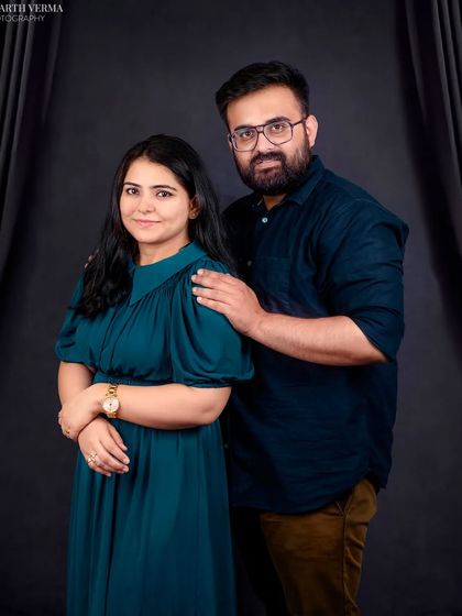 A beautiful couples portrait. This shot focuses on the parents, reminding us that every family story begins with the love between two people.