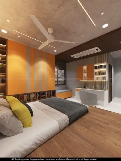 A full view of the kids' bedroom, showcasing the integrated wardrobe, bookshelf, and study area.