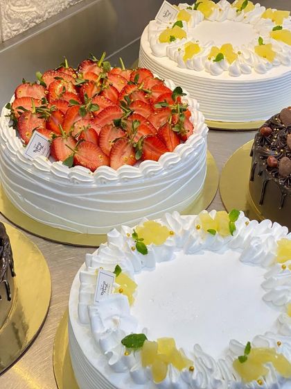 Another view of the fresh fruit and chocolate cakes, perfect for any event.
