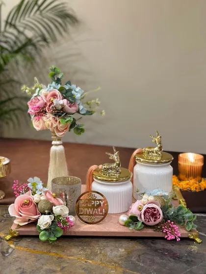 This wide shot shows the complete pink marble tray hamper, a perfect centerpiece for any home during the festive season. It's a gift that keeps on giving as a beautiful decor item.