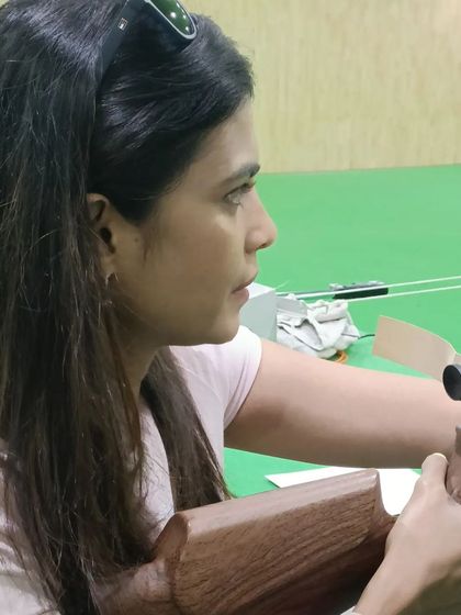 A close-up of Dhyanchand Awardee Trupti Murgunde, showing the intense focus required in shooting. Her concentration and quick adaptation to the sport were truly impressive.