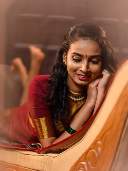 A candid, happy moment captured during a traditional shoot. The soft focus and warm tones give this image a gentle and personal feel, perfect for capturing genuine emotion.
