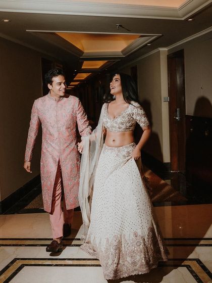 Aren't they the cutest couple? Shubhangi and her fiancé sharing a happy moment during their engagement photoshoot.