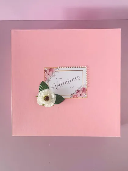 A beautiful pink box for Valentine's Day. The custom tag and delicate flower make for a very romantic presentation.