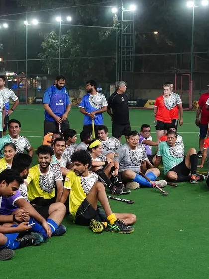 Players from different teams relaxing together after the matches. These tournaments are as much about building friendships as they are about competition.