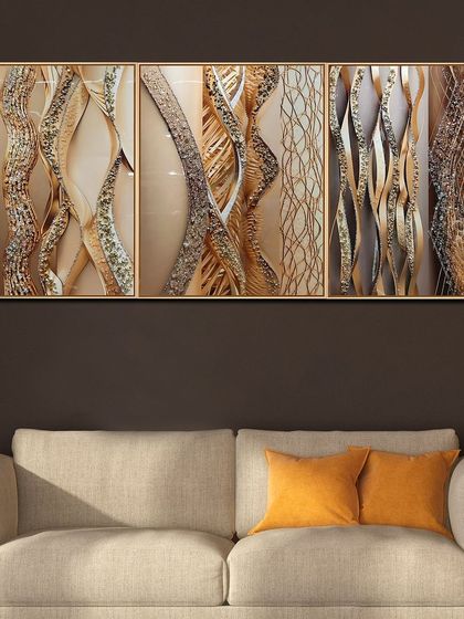 This set of three crystal glass paintings, titled 'Rhythms of Texture', creates a stunning abstract display. The flowing lines of gold and textured crystals form a cohesive piece that adds movement and opulence to a room.
